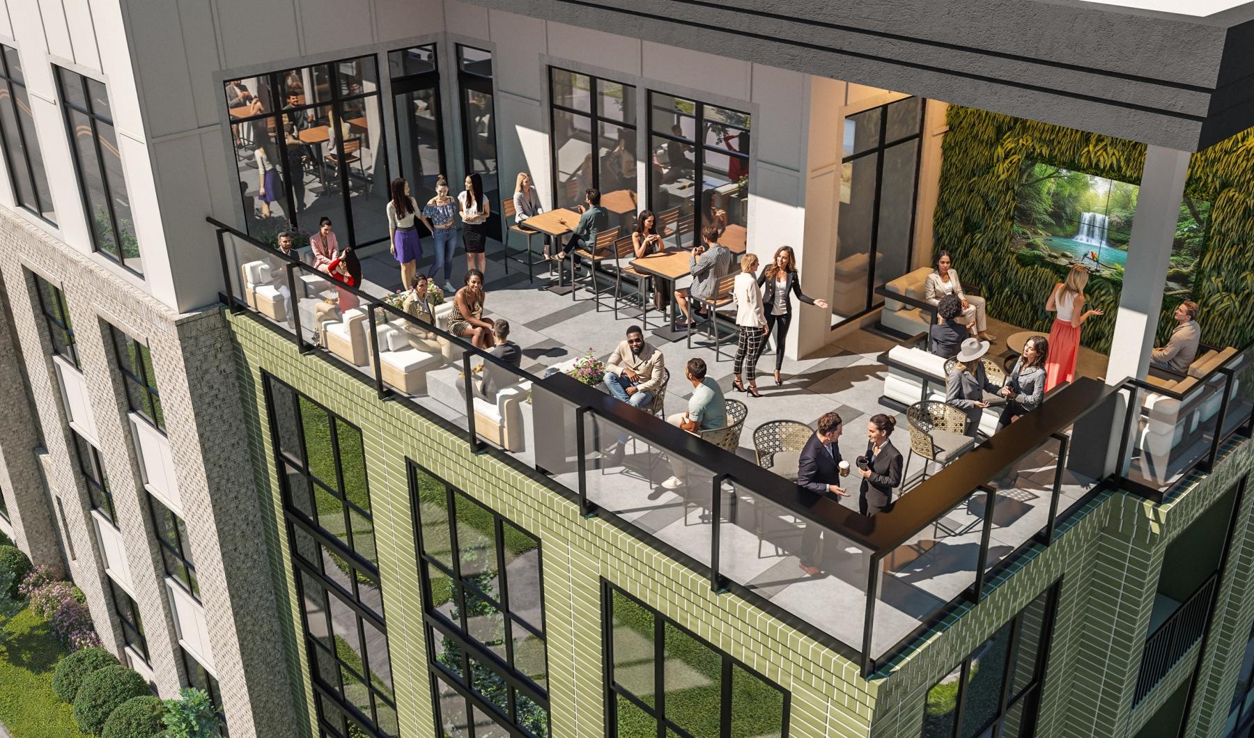 a group of people on a rooftop lounge