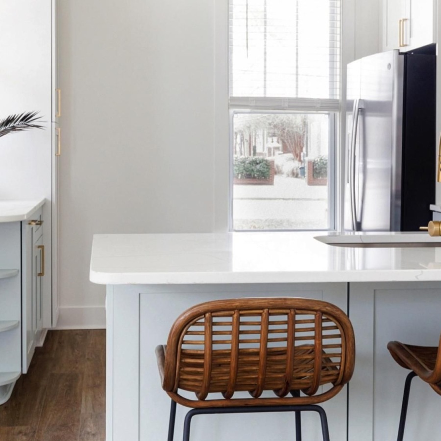 a kitchen with a table and chairs