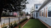 a small yard next to a house