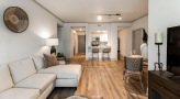 a living room with a couch and a tv