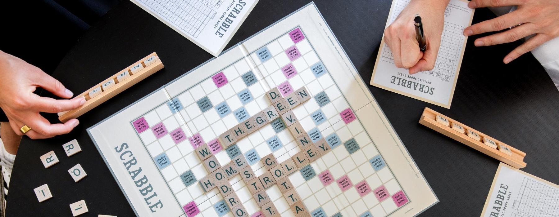 people playing Scrabble