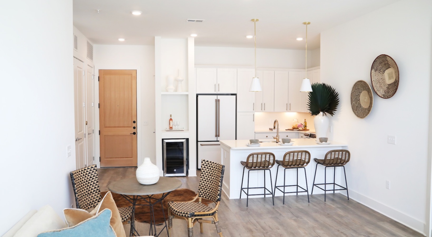 living room with dining room table seating and kitchen